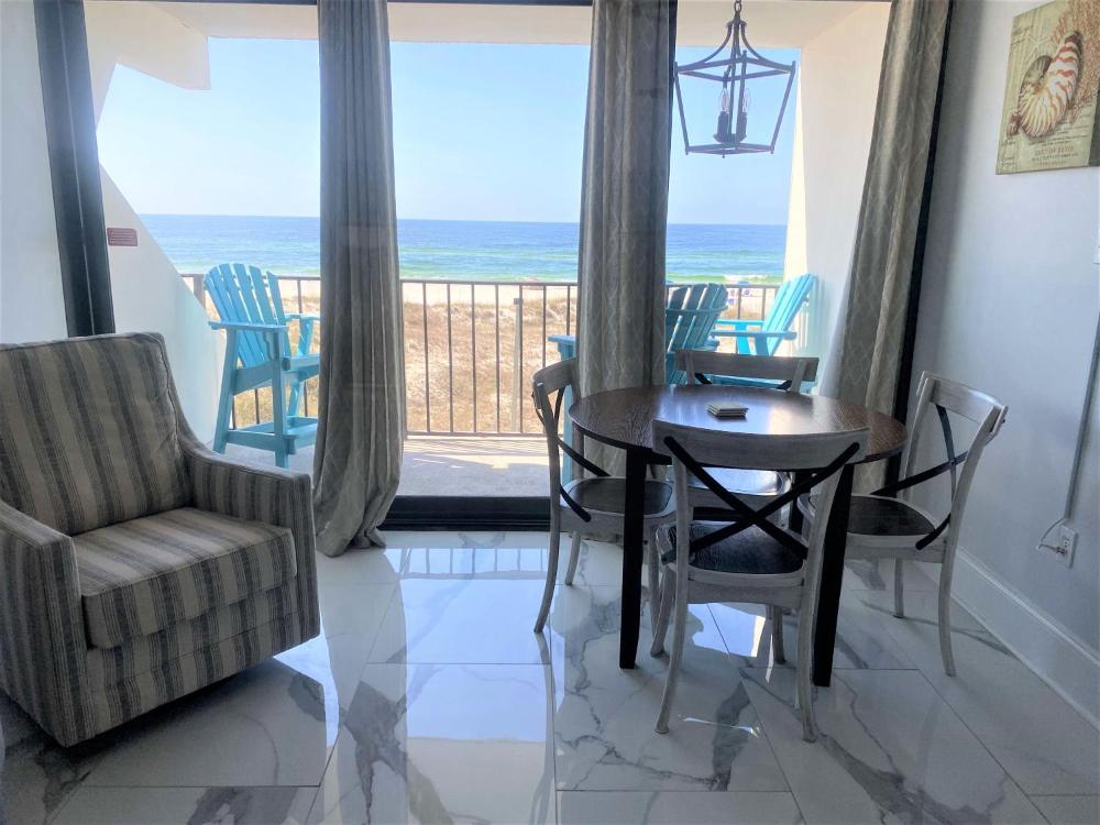 Island Winds East 202 by ALBVR - Beautifully renovated beachfront condo & steps away from Hangout & more!